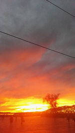 Scenic view of dramatic sky during sunset