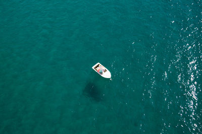 High angle view of boat sailing on sea