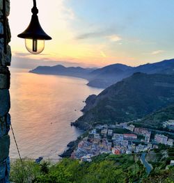 Scenic view of mountains against sky at sunset