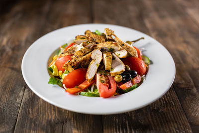 High angle view of salad in plate on table