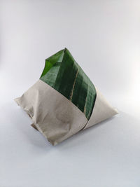 High angle view of paper over white background