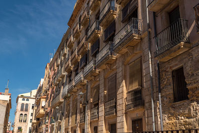 Low angle view of buildings against sky