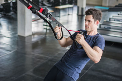 Man exercising in gym