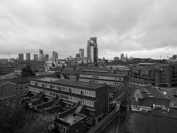 High angle view of buildings in city against sky