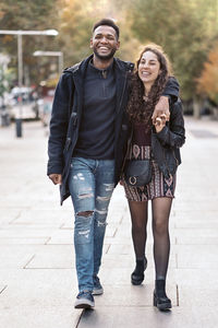 Portrait of a smiling young couple