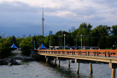 View of bridge over river against buildings