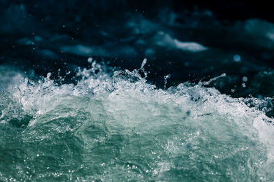 Close-up of water splashing in sea