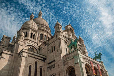 Low angle view of temple building against sky