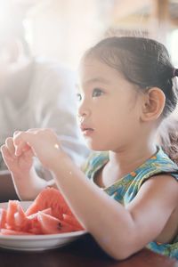 Portrait of girl eating ice cream