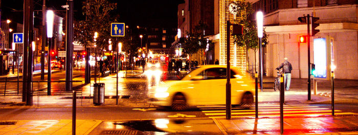 Illuminated street light at night