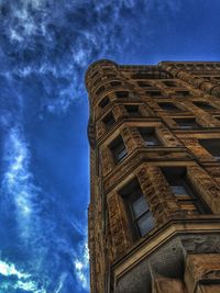 Low angle view of building against blue sky