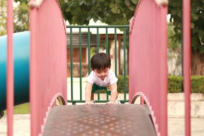 Boy playing in playground