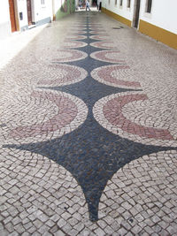 High angle view of paving stone on footpath