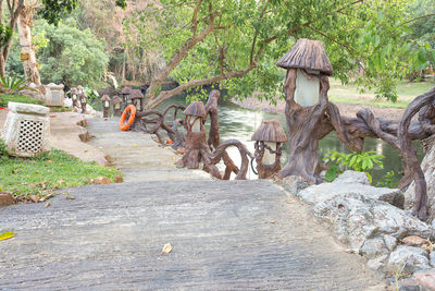 Statue against trees