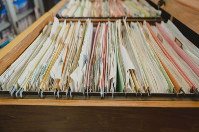 Close-up of umbrellas on table