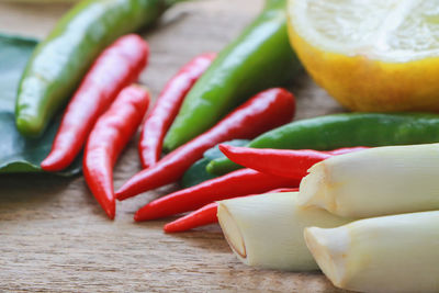 Close-up of red chili peppers on table