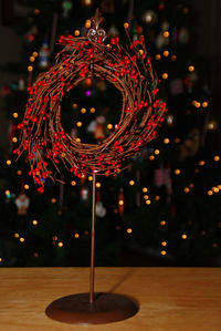 Close-up of illuminated christmas decoration on table