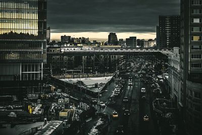 View of illuminated buildings in city