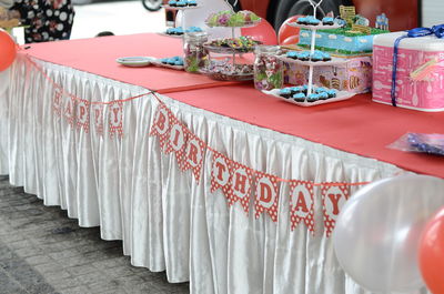 Row of decoration on table at temple