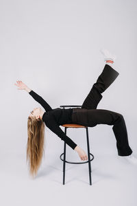 Full length studio portrait of exciting young woman fashion designer, stylist. fashionable stylish