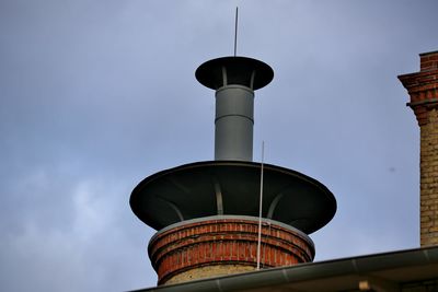 Low angle view of water tower against sky