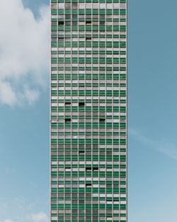 Low angle view of skyscraper against sky
