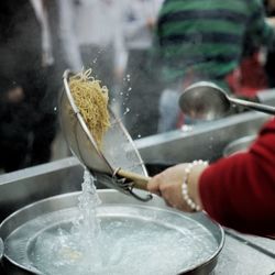 Close-up of man hand in water