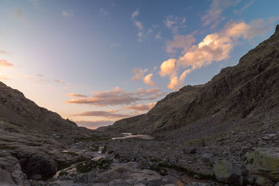 Scenic view of mountains against sky during sunset