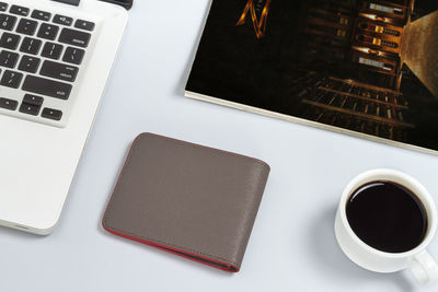 High angle view of coffee cup on table