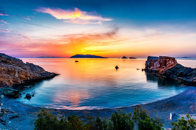 Sunrise on vardia beach at folegandros island, greece.