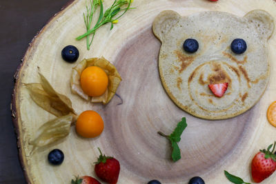 High angle view of fruits on cutting board