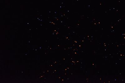 Low angle view of star field against sky at night