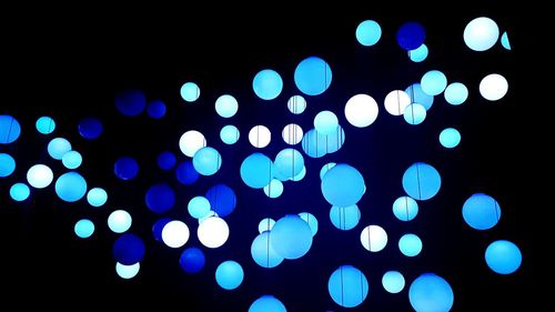 Defocused lights against black background