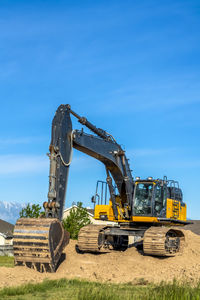 Construction site on field against sky