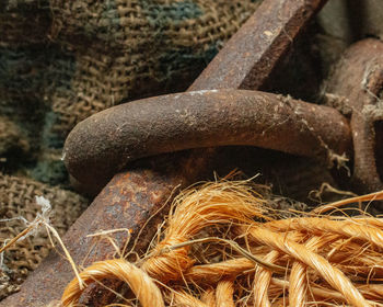 Close-up of rusty metal on field