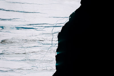 High angle view of glacier in sea