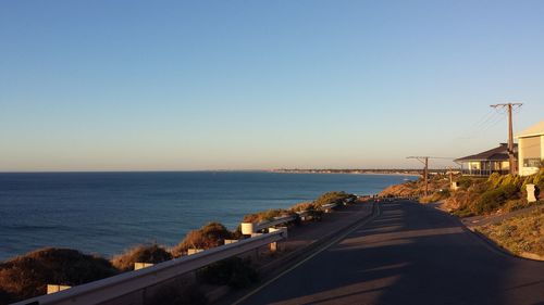 View of calm blue sea against clear sky