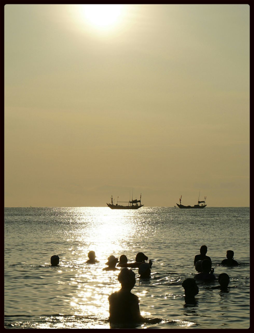 water, sea, transfer print, horizon over water, silhouette, auto post production filter, sunset, sun, scenics, tranquil scene, tranquility, sky, beauty in nature, nature, bird, nautical vessel, transportation, sunlight, reflection, idyllic