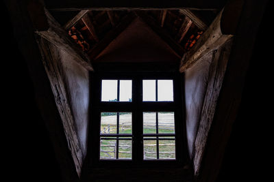 Low angle view of window in old building