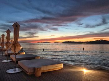 Scenic view of sea against sky at sunset