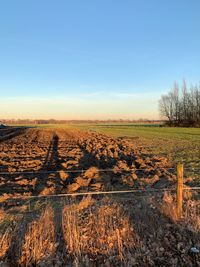 Scenic view of landscape against clear blue sky