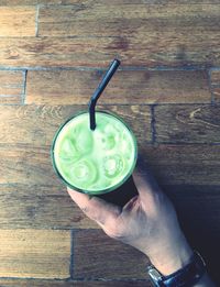 Close-up of hand holding drink