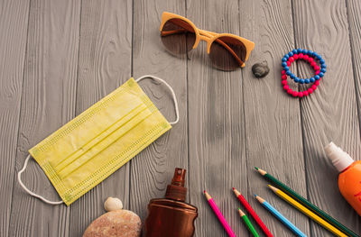 High angle view of personal accessories on table