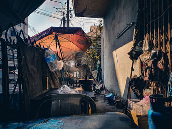 Street light at market stall in city