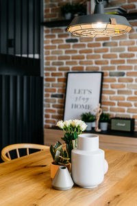 Potted plant on table at home