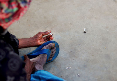 High angle view of man standing on street