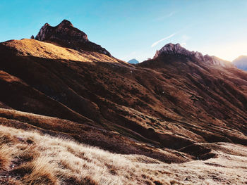 Scenic view of rocky mountains against sky