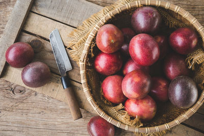 High angle view of apples in basket on table