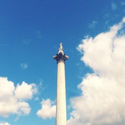 Low angle view of building against blue sky