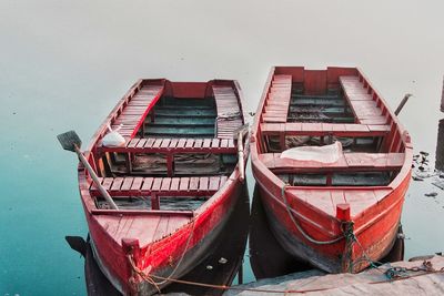 Boats moored in water